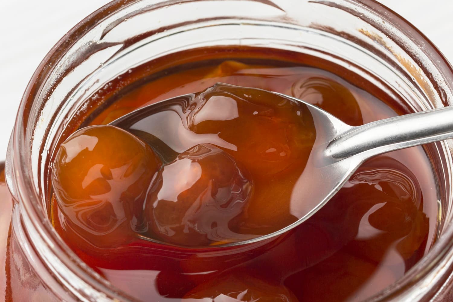 demi glace en tarro con cuchara
